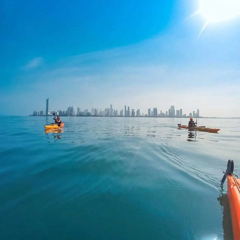 Kayakers exploring Cartagena Bay en route to Punta Arena