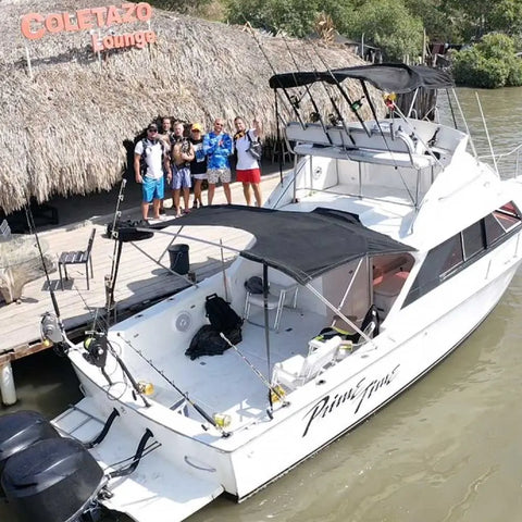 Guests fishing on a charter boat off the coast of Cartagena