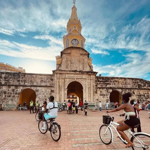 Cyclists exploring the colorful streets of Cartagena’s Walled City - Juan Ballena